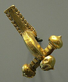 A cruciform Roman fibula, or buckle from Lutetia