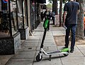 Lime Scooter On A Sidewalk In Oakland, California