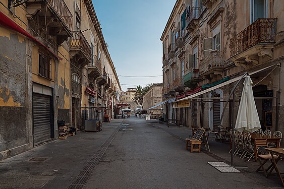 Building with balconies in the Via Emanuele De Benedictis in Ortygia, Syracuse with a view to the Temple of Apollo