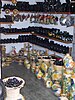 An inside corner of a shop featuring rows of black and yellow pottery items