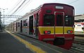 KRL Toyo Rapid 1080F formasi 10 kereta di Bogor, Indonesia, Juli 2017