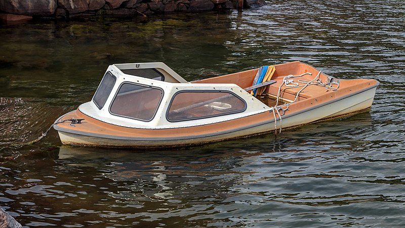 File:Half-sunk motorboat in Holma Marina.jpg