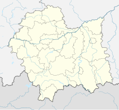 Mapa konturowa województwa małopolskiego, blisko centrum na lewo u góry znajduje się punkt z opisem „Pałac Juliana Dunajewskiego”