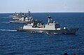 ROKS Chungmugong Yi Sun-shin and USS John Paul Jones alongside each other during RIMPAC 2004.