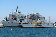 USNS Amelia Earhart (T-AKE-6) dockside beside USNS Robert E. Peary (T-AKE-5)