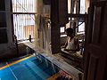 Weaver in a silk-weaving workshop; Varanasi, Uttar Pradesh, India