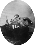 Thomas Edison in 1888 listening to a wax cylinder phonograph at the Edison laboratory, Orange, N.J.