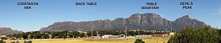 Table Mountain as viewed from The Cape Flats. From this angle, it does not clearly resemble the table shape it is named for.