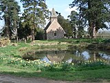 Medieval church with duck pond