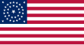 U.S. flag (34 stars, as it was in 1861.