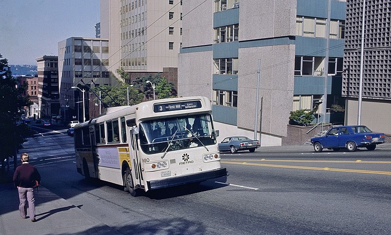 File:Seattle AM General trolleybus climbing James St near 5th Ave in 1983.jpg