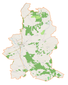 Mapa konturowa gminy Dąbrowa Tarnowska, blisko centrum na lewo znajduje się punkt z opisem „Synagoga w Dąbrowie Tarnowskiej”