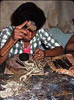 Carving the leather in a Yogyakarta factory