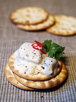 Crackers with herring and garlic sauce.jpg