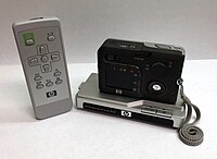 Back of HP PhotoSmart R607 with LCD display and R-Series dock with remote control