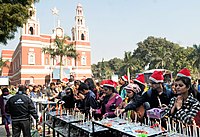 Devotees light candles and pray outside the Sacred Heart Cathedral, New Delhi on the occasion of Christmas