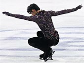 Hanyu in the opening pose of his free skate program 'Origin' at the 2019 Grand Prix Final in Turin