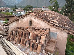 Urubamba Peru- clay tiles stacked next to house.jpg