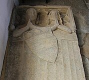 Effigial slab for Sir William de Bayous (d. c. 1327) and his wife. Church of St Stephen, Careby, Lincolnshire, England.[85]