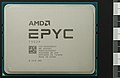 English: CPU AMD Epyc 7302P top side with mm scale