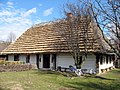 Ein Umgebindehaus im Museum der Volksbauweise in Markowa. Umgebindehäuser zeugen von der Handweberei des 16. bis 19. Jahrhundert.[58]