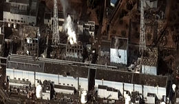 Satellite image on 16 March of the four damaged reactor buildings