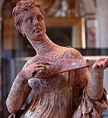 Ancient Greek Tanagra figurine, 200 BC.