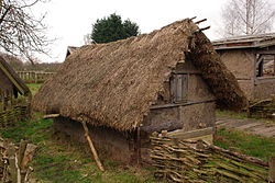 Reconstruction of a Viking house at Danelaw Dark Age Village, York.