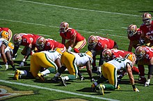 The 49ers offense lined up prior to the snap against the Packers defense.