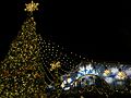 50-Foot Tall Christmas Tree with Das Festhaus in the Background.