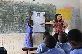 An ICS volunteer delivers a sexual health lesson.jpg