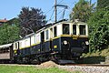 Kombinierter Gepäck- und Posttriebwagen der Montreux-Berner Oberland-Bahn, ausgeführt als Gelenkfahrzeug mit Jakobsdrehgestell