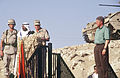 Gen. J.H. Binford Peay III. speaks to American and Kuwaiti tro=t William Jefferson Clinton upon his arrival to Ramstein Air Base, Germany, May 5, 1999