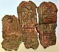 Bronze plate with a cartouche of the throne name of Akhenaten (left) and two late form cartouches for Aten (middle, right). Amarna, Egypt. New Kingdom, late 18th Dynasty. Neues Museum, Berlin, Germany.