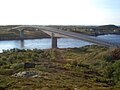 Åkviksundet Bridge in Norway, with Dønna in the foreground and Staulen, Herøy, in the background.