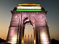 The gate is illuminated with colors of the Indian flag