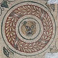 mosaic showing a tiger's head in Piazza Armerina, Italy