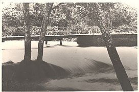 Mudi Bridge, Mudi in Flood.jpg