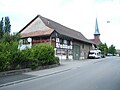 Niederhasli, Bauernhaus und Reformierte Kirche