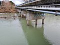 SH77 bridge with supports exposed as a result of erosion and flooding - Glentunnel, NZ. June 2021