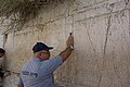 Deutsch: Beten per Handy an der Klagemauer in Jerusalem English: Praying via mobile phone at the Western Wall in Jerusalem used on 1 pages in 1 wikis