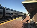 An outbound train towards Elgin stopped at the Bensenville Metra station.