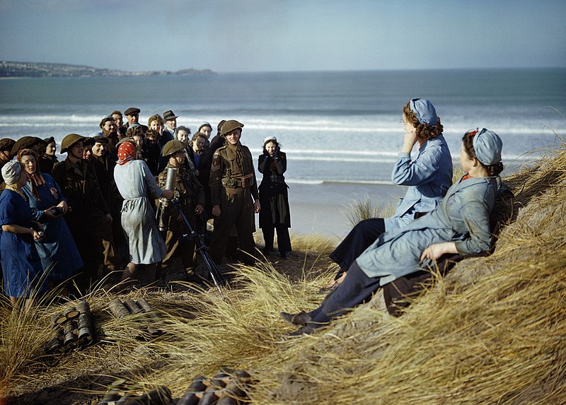 File:Women workers from the small West Country arms factory of J & F Pool Ltd in Hayle, Cornwall, are given a mortar firing demonstration, 1943. TR673.jpg