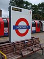 Roundel on eastbound platform face in July 2008