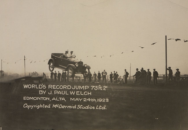 Guys jumping 73 feet in 1920s car: