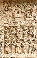 The Visit of Indra to the Buddha in the Indrasaila cave. The Buddha is symbolized by his throne. Wild animal are depicted around the cave (Stupa 1 Northern Gateway, Sanchi. 1st century BCE/CE)