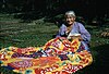 Woman sewing a tivaevae at Rarotonga