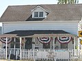 House with American flag bunting in Nicasio