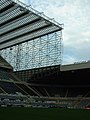 The method of supporting the end of the north stand using the north east corner roof