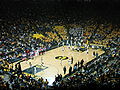 Iowa Hawkeyes and Penn State Nittany Lions men's basketball players warm up before a game at Carver-Hawkeye Arena in Iowa City, Iowa.